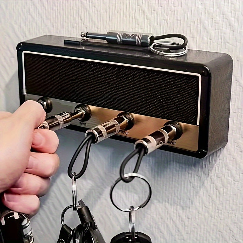A Creative Speaker Keychain Set That Includes Four Insertable Keychains And a Wall Mounting Kit - Casual Style, Easy to Install, Made of Metal, Perfect for Space-Saving Home Storage And Decoration Enthusiasts.